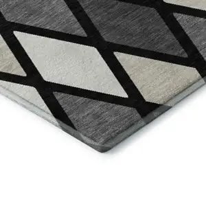 Photo of Black Ivory And Gray Geometric Washable Area Rug With UV Protection