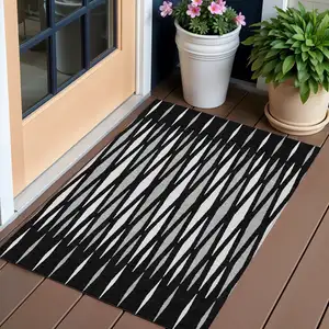 Photo of Black Ivory And Gray Geometric Washable Indoor Outdoor Area Rug