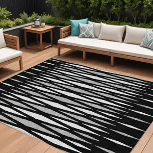Photo of Black Ivory And Gray Geometric Washable Indoor Outdoor Area Rug