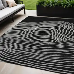 Photo of Black Ivory And Gray Striped Washable Indoor Outdoor Area Rug