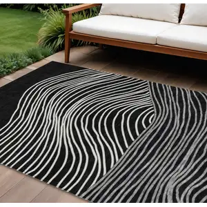Photo of Black Ivory And Gray Striped Washable Indoor Outdoor Area Rug