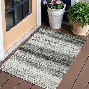 Photo of Black Ivory And Gray Striped Washable Indoor Outdoor Area Rug