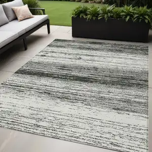 Photo of Black Ivory And Gray Striped Washable Indoor Outdoor Area Rug