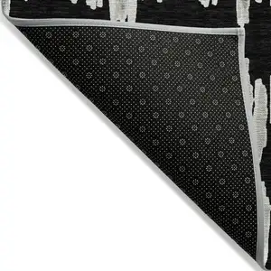 Photo of Black Ivory And Gray Striped Washable Indoor Outdoor Area Rug