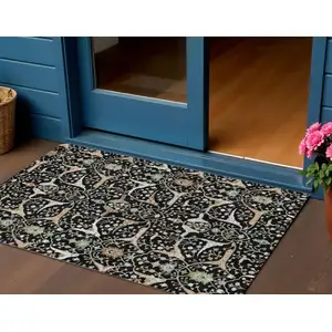 Photo of Black Ivory And Green Floral Washable Indoor Outdoor Area Rug