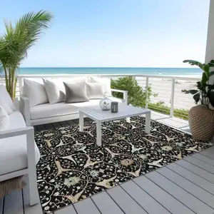 Photo of Black Ivory And Green Floral Washable Indoor Outdoor Area Rug