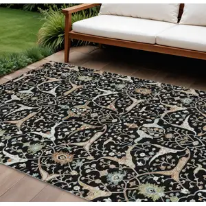 Photo of Black Ivory And Green Floral Washable Indoor Outdoor Area Rug