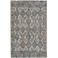 Photo of Black Ivory And Green Wool Geometric Tufted Handmade Distressed Area Rug