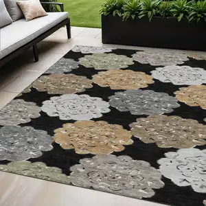 Photo of Black Ivory And Khaki Quatrefoil Washable Indoor Outdoor Area Rug
