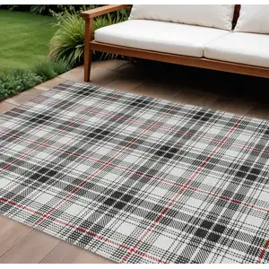 Photo of Black Ivory And Red Plaid Washable Indoor Outdoor Area Rug