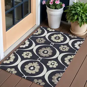 Photo of Black Ivory And Taupe Medallion Washable Indoor Outdoor Area Rug