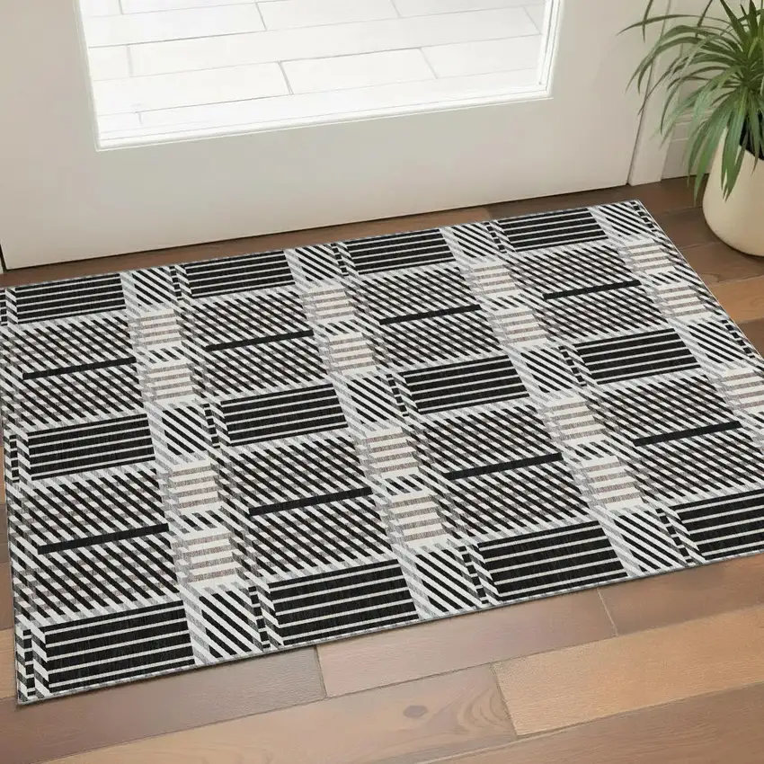 Black Ivory And Taupe Plaid Washable Area Rug With UV Protection Photo 1