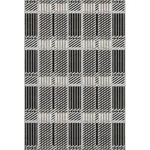 Photo of Black Ivory And Taupe Plaid Washable Area Rug With UV Protection