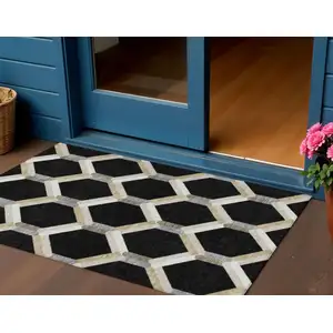 Photo of Black Ivory And Wheat Geometric Washable Indoor Outdoor Area Rug