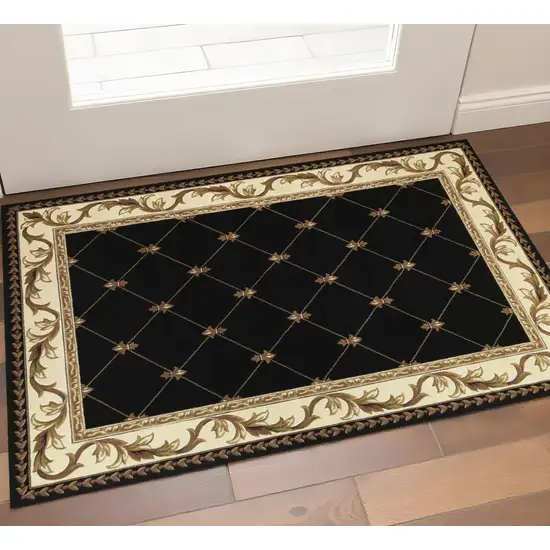 Black Machine Woven Hand Carved Fleur De Lis Indoor Accent Rug Photo 1