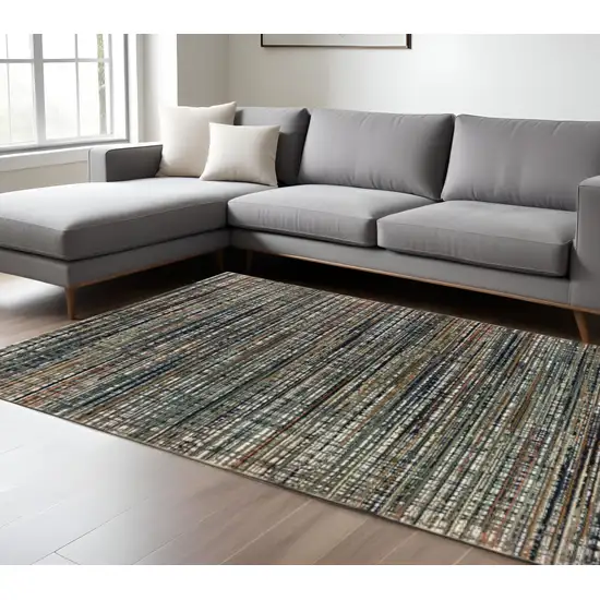 Black Navy Gold Ivory And Blush Abstract Power Loom Stain Resistant Area Rug Photo 1