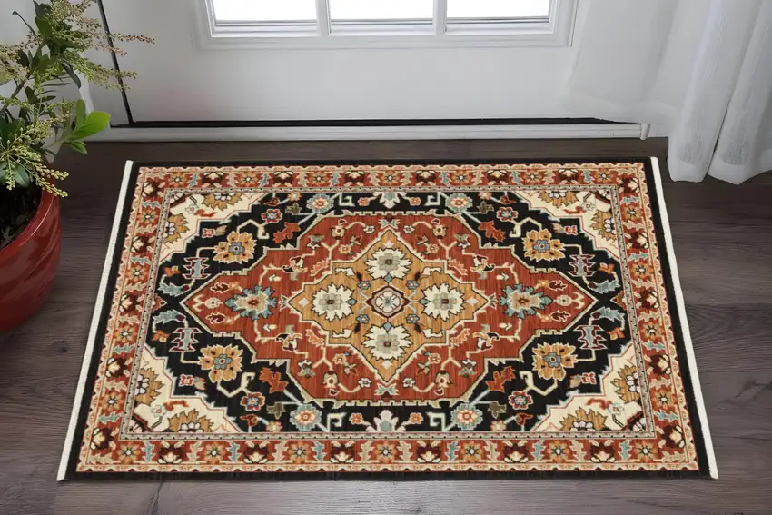 Black and Orange Oriental Power Loom Area Rug Photo 1
