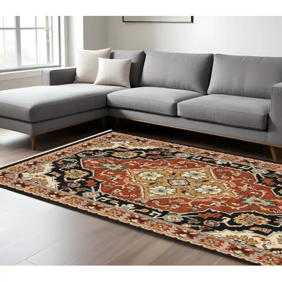 Black And Red Oriental Area Rug With Fringe Photo 1