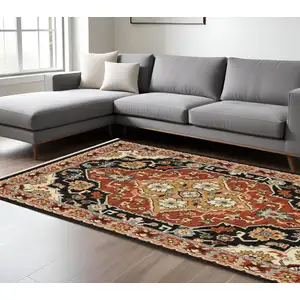 Photo of Black Orange And Beige Oriental Power Loom Stain Resistant Area Rug With Fringe