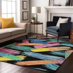 Photo of Black Pink And Yellow Striped Washable Area Rug With UV Protection