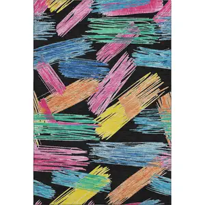 Photo of Black Pink And Yellow Striped Washable Area Rug With UV Protection