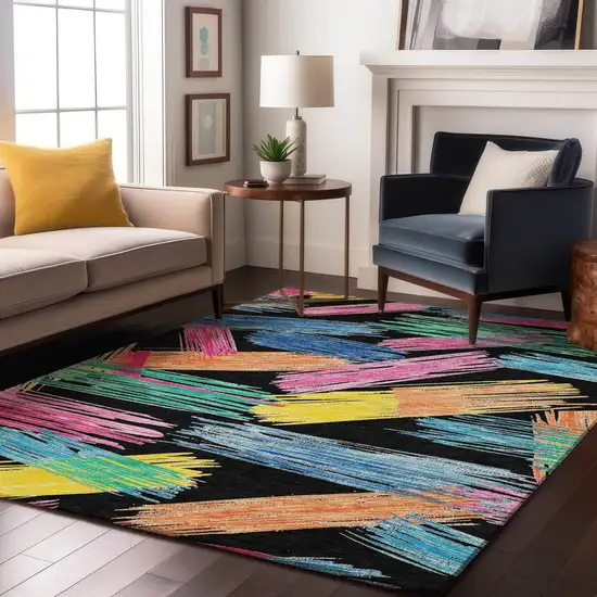 Black Pink And Yellow Striped Washable Area Rug With UV Protection Photo 1