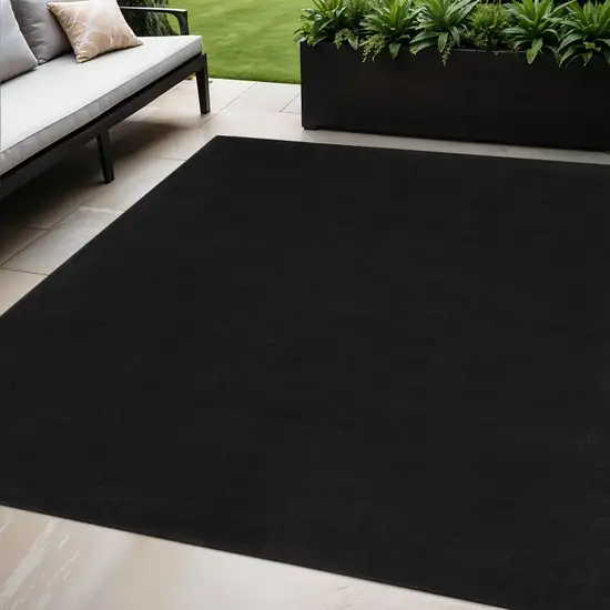 Black Power Loom Area Rug Photo 1