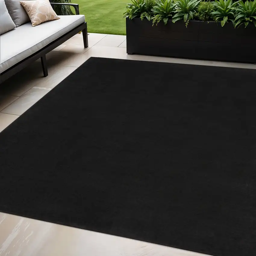 Black Power Loom Area Rug Photo 1