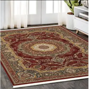 Photo of Black Red And Tan Medallion Area Rug With Fringe