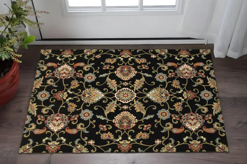 2' X 4' Green and Black Floral Power Loom Area Rug Photo 1