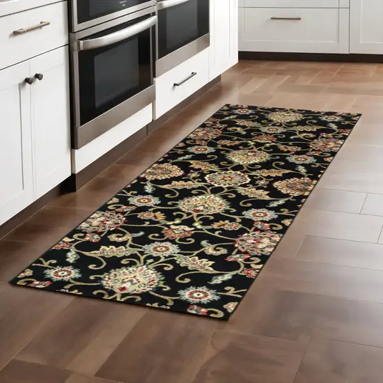 2' X 8' Black Red Green Ivory Salmon And Yellow Floral Power Loom Stain Resistant Runner Rug Photo 1