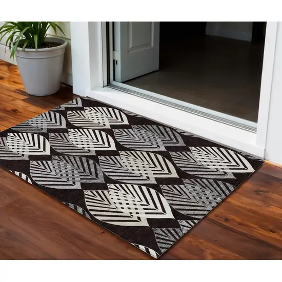 Black Silver And Charcoal Floral Washable Indoor Outdoor Area Rug Photo 1