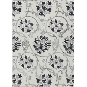 Photo of Black Silver And Charcoal Floral Washable Indoor Outdoor Area Rug