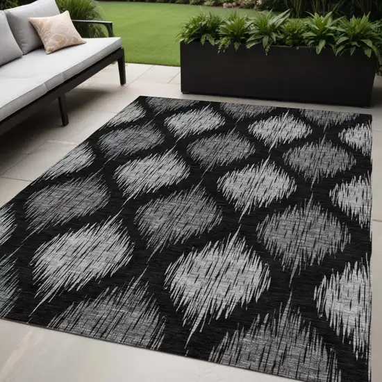 Black Silver And Gray Ikat Washable Indoor Outdoor Area Rug Photo 1