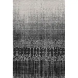 Photo of Black Silver And Gray Ombre Washable Area Rug With UV Protection