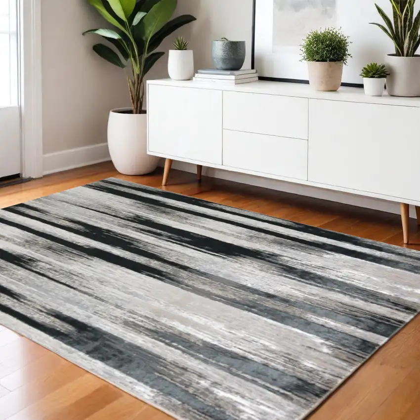 Black Silver and Gray Abstract Power Loom Area Rug Photo 1