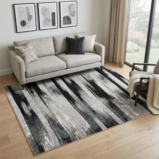 Black Silver and Gray Abstract Power Loom Area Rug Photo 1
