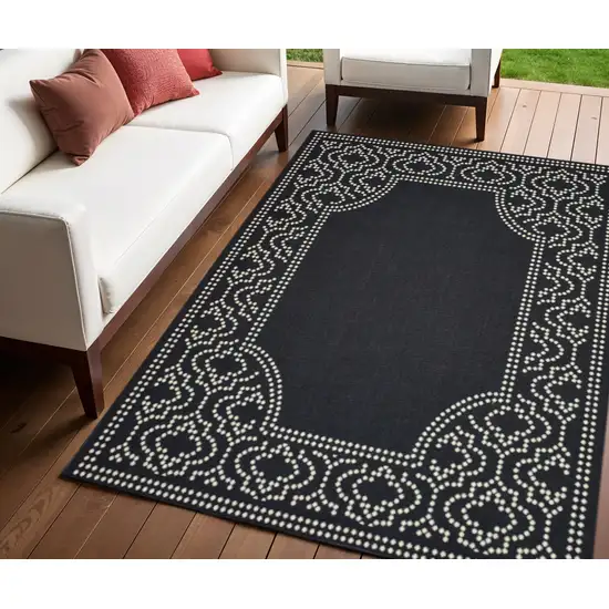 Black and Ivory Stain Resistant Indoor Outdoor Area Rug Photo 1