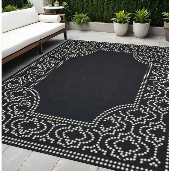 Black and Ivory Stain Resistant Indoor Outdoor Area Rug Photo 1