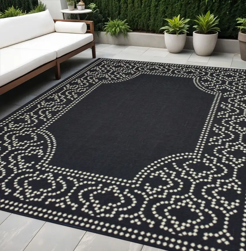 Black and Ivory Stain Resistant Indoor Outdoor Area Rug Photo 1