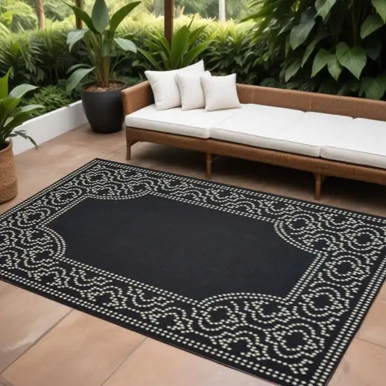 Black and Ivory Stain Resistant Indoor Outdoor Area Rug Photo 1