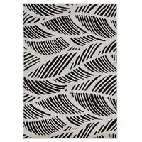 Photo of Black White Machine Woven UV Treated Oversized Leaves Indoor Outdoor Area Rug