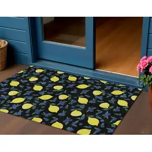 Photo of Black Yellow And Blue Lemons Washable Indoor Outdoor Area Rug
