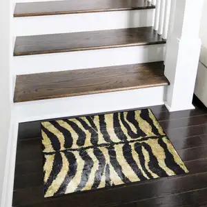 Photo of Black and Gold Animal Print Shag Handmade Non Skid Area Rug
