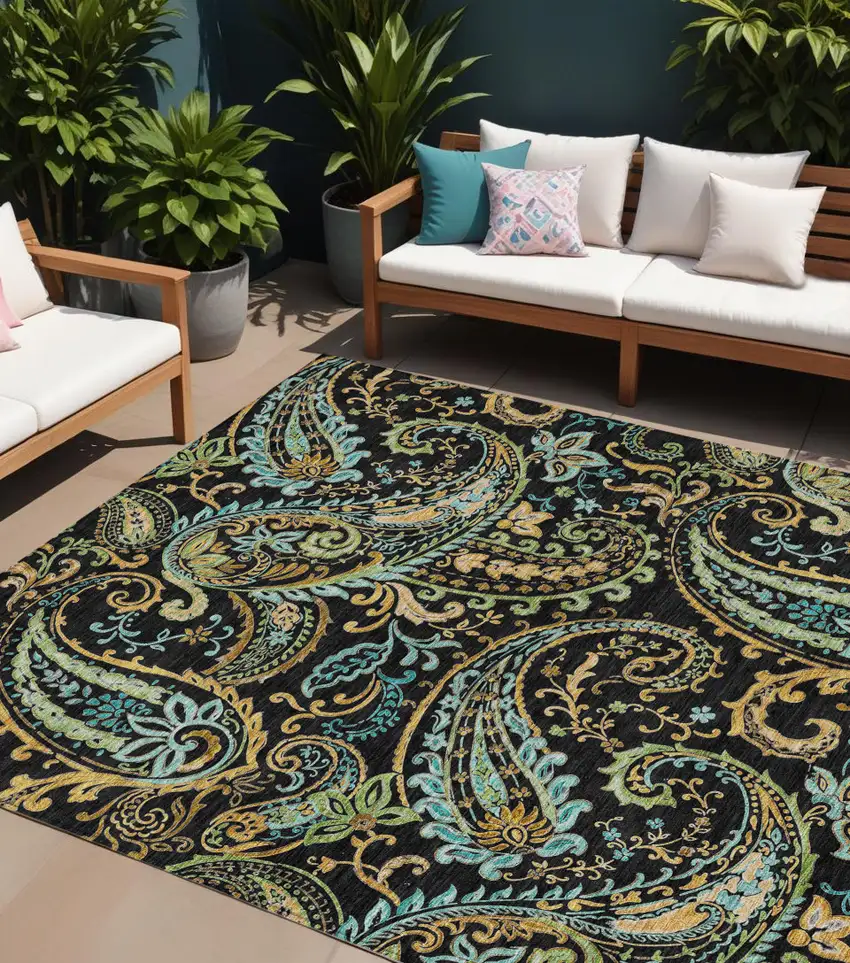 Black and Gold Paisley Washable Indoor Outdoor Area Rug Photo 1