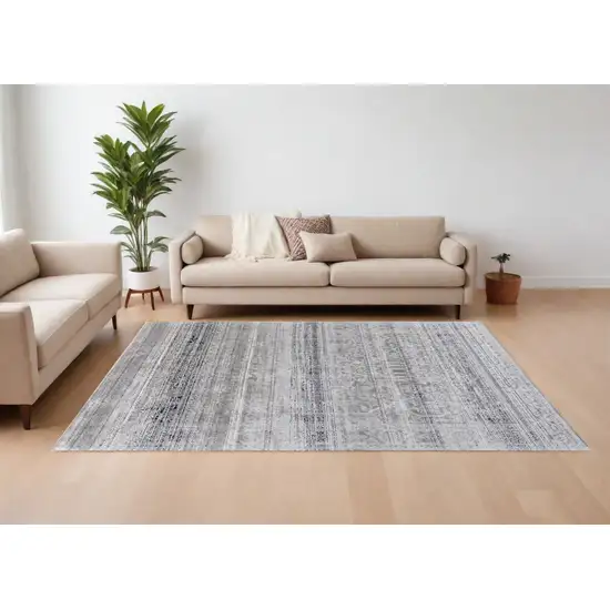 Black and Gray Abstract Power Loom Worn Faded Area Rug Photo 1