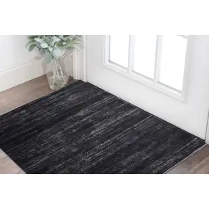 Photo of Black and Gray Power Loom Area Rug