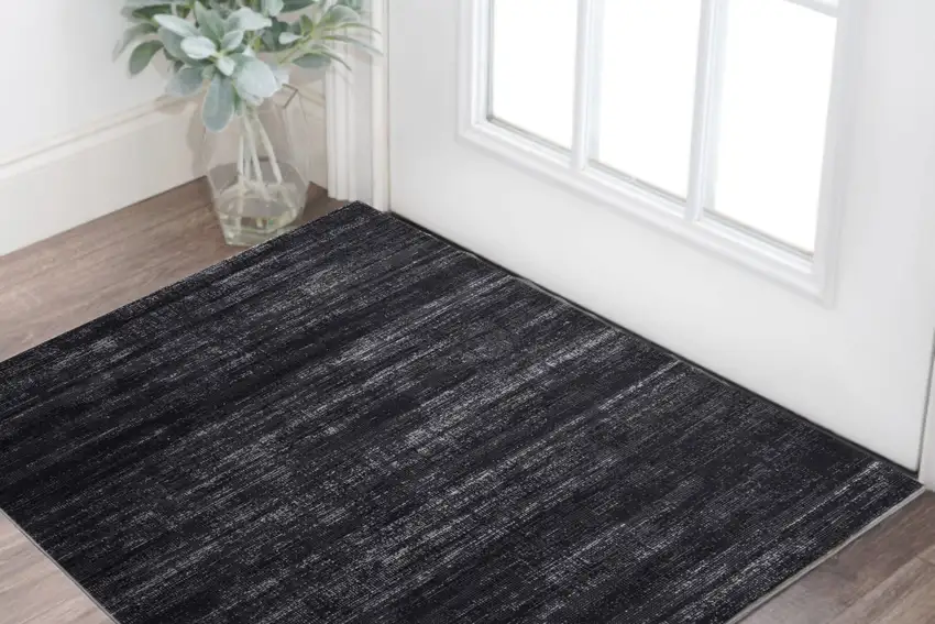 Black and Gray Power Loom Area Rug Photo 1