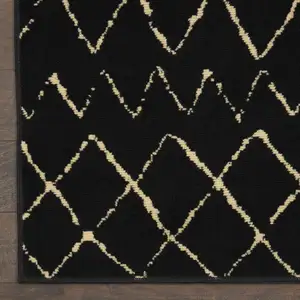 Photo of Black and Ivory Abstract Power Loom Distressed Area Rug