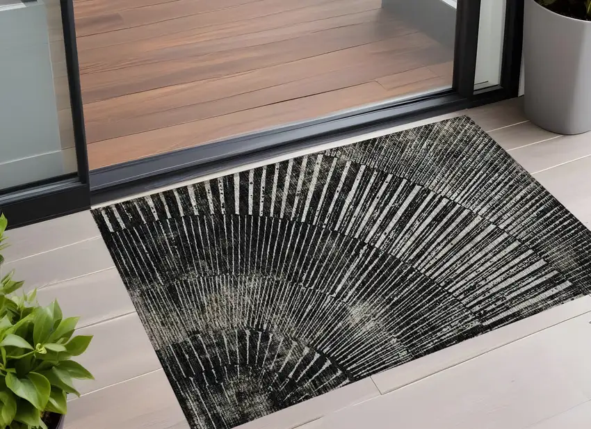 Black and Ivory Abstract Washable Non Skid Indoor Outdoor Area Rug Photo 1